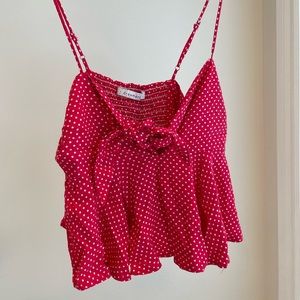 Red polka dot top with front tie knot